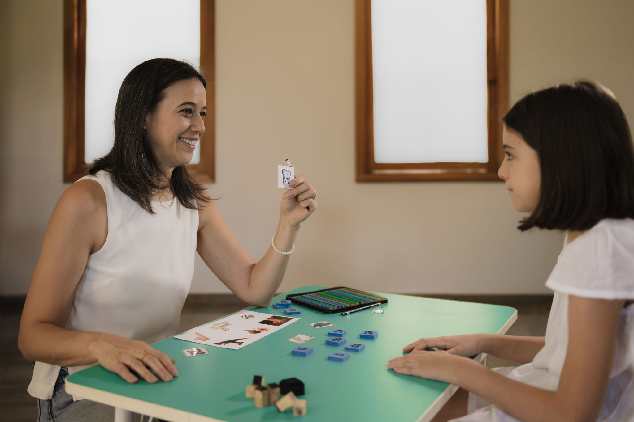 Dra. Psicóloga Raquel Golfeto interagindo com paciente 2